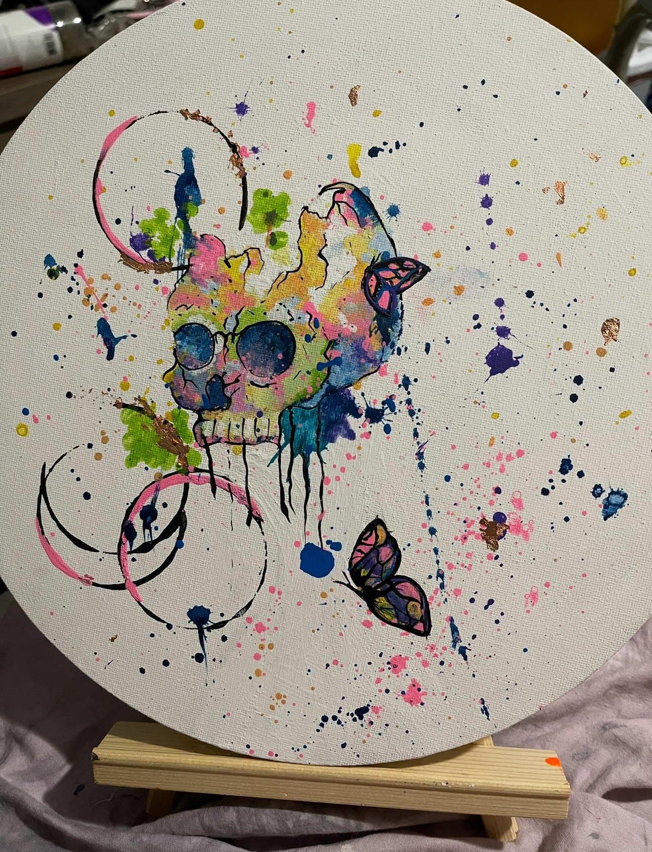 Colorful expressive skull and butterflies artwork by Traci Rogers